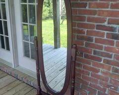 Nice Dark Cherry Wood Mirror on stand, nice for corner area or elsewhere.