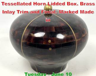 Lot 344 Maitland Smith style Inlaid Tessellated Horn Lidded Box. Brass Inlay Trim and Finial. Marked Made in