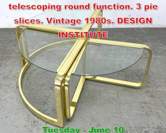 Lot 395 Brass and glass table with telescoping round function. 3 pie slices. Vintage 1980s. DESIGN INSTITUTE