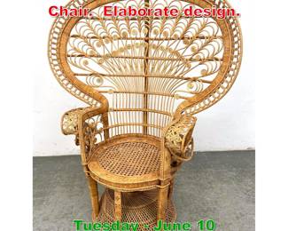 Lot 945 Vintage Rattan Peacock Chair. Elaborate design.