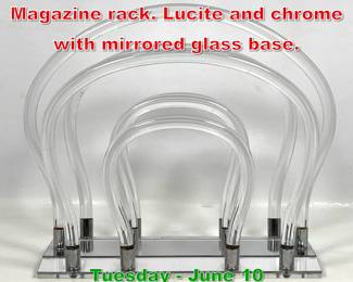 Lot 477 Dorothy Thorpe Style Magazine rack. Lucite and chrome with mirrored glass base.