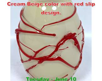 Lot 339 Signed Art Glass vase. Cream Beige color with red slip design.