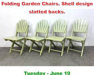Lot 735 Set 4 Painted Wood Slat Folding Garden Chairs. Shell design slatted backs.