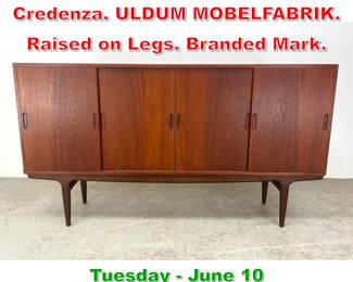 Lot 480 Danish Modern Teak Credenza. ULDUM MOBELFABRIK. Raised on Legs. Branded Mark.