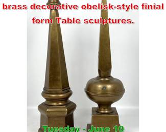 Lot 496 2pc Brass Lot. Large brass decorative obeliskstyle finial form Table sculptures.