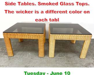 Lot 766 2pc Woven wicker Square Side Tables. Smoked Glass Tops. The wicker is a different color on each tabl