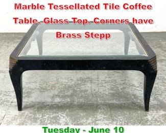 Lot 886 Maitland Smith style Black Marble Tessellated Tile Coffee Table. Glass Top. Corners have Brass Stepp