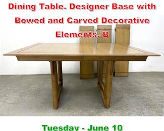 Lot 814 Asian inspired Light Walnut Dining Table. Designer Base with Bowed and Carved Decorative Elements. B