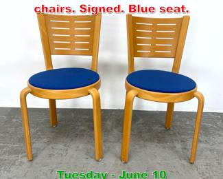 Lot 411 Pair Magnus Olesen side chairs. Signed. Blue seat.