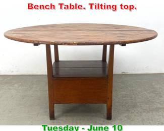 Lot 552 Antique Country Pine Bench Table. Tilting top.