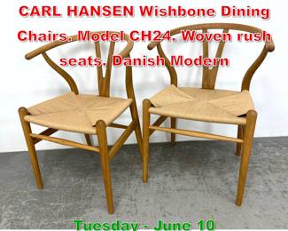 Lot 774 Pr HANS J WEGNER for CARL HANSEN Wishbone Dining Chairs. Model CH24. Woven rush seats. Danish Modern
