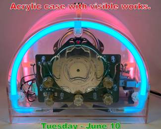 Lot 417 SONIC Am Fm Neon Radio. Acrylic case with visible works.