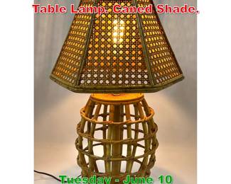 Lot 573 Bamboo Rattan Barrel form Table Lamp. Caned Shade.