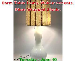 Lot 421 Modern Glass Bowling Pin Form Table Lamp. Walnut accents. Fiber Wrapped Shade.