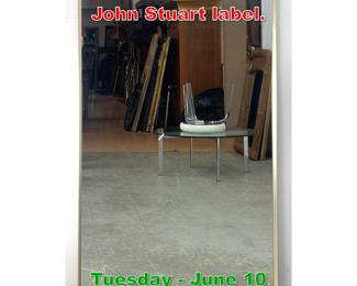 Lot 923 Metal Framed Wall Mirror. John Stuart label.