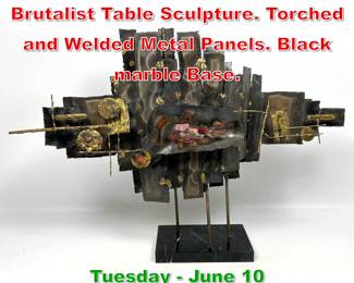 Lot 424 Welded Mixed Metal Brutalist Table Sculpture. Torched and Welded Metal Panels. Black marble Base.