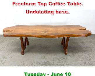 Lot 420 Artisan Walnut Wood Slab Freeform Top Coffee Table. Undulating base.