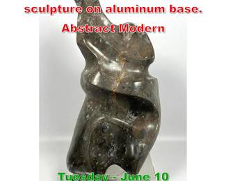 Lot 637 Igneous fossil stone sculpture on aluminum base. Abstract Modern