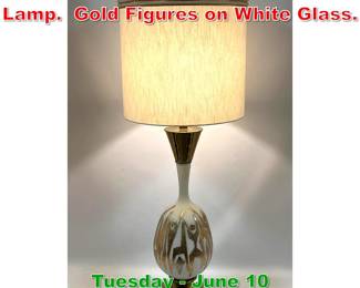 Lot 394 Mid Century Modern Table Lamp. Gold Figures on White Glass.