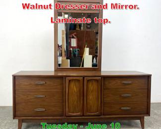Lot 572 2pc American Modern Walnut Dresser and Mirror. Laminate top.