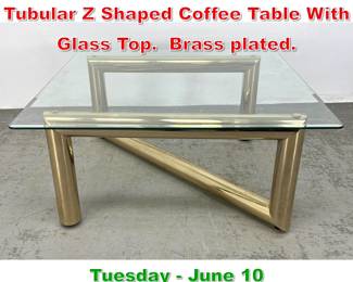Lot 893 Karl Springer Style Brass Tubular Z Shaped Coffee Table With Glass Top. Brass plated.