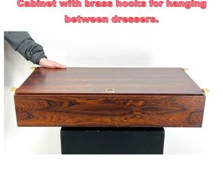 Lot 1361 Danish Modern Rosewood Vanity Cabinet with brass hooks for hanging between dressers.