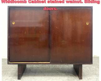Lot 1404 TH RobsjohnGibbings for Widdicomb Cabinet stained walnut. Sliding doors.