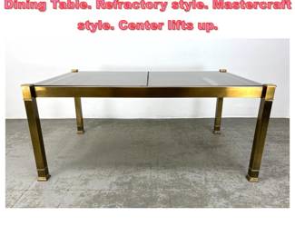Lot 1276 Brass Frame Glass Top Modernist Dining Table. Refractory style. Mastercraft style. Center lifts up.
