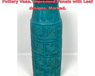 Lot 1022 MCM West German Teal Glazed Pottery Vase. Impressed Panels with Leaf designs. Marked.