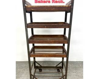 Lot 1489 Iron and Wood Rolling Bakers Rack.