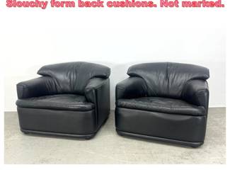 Lot 1275 Pr Black Leather Lounge Chairs. Slouchy form back cushions. Not marked.