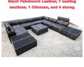 Lot 1384 De Sede DS88 Sectional Sofa in Black Patchwork Leather, 7 seating sections. 1 Ottoman, and 4 storag