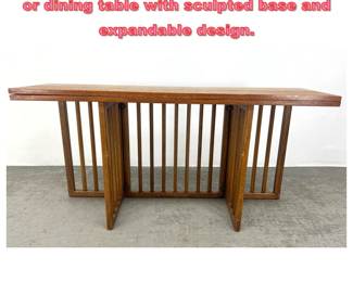 Lot 1419 Broyhill Premier fliptop console or dining table with sculpted base and expandable design. 