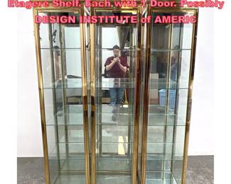 Lot 1093 Set 3 Brass Column Form Display Etagere Shelf. Each with 1 Door. Possibly DESIGN INSTITUTE of AMERIC