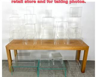 Lot 1295 41 lucite risers shelves from retail store and for taking photos.