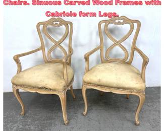 Lot 1407 Louis XV style French Arm Chairs. Sinuous Carved Wood Frames with Cabriole form Legs.