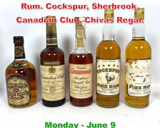 Lot 233 5 Bottles. Whiskey and Fine Rum. Cockspur, Sherbrook, Canadian Club, Chivas Regal.