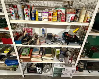 Lots of miscellaneous items in the garage. Cleaning supplies, paints, screwdrivers, sockets, pliers, Grills, pressure, washer, and so much more.