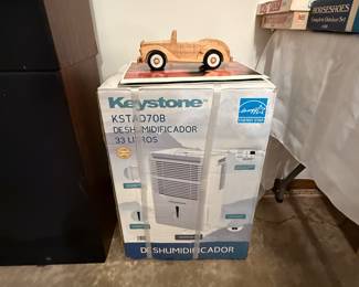 Brand Spanking New Dehumidifier in the box. Cost about $150 new. Get a better deal here.