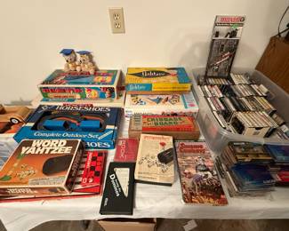 Games and music. We have Monopoly, Battleship, Yahtzee, Horseshoes, old Legos, and more