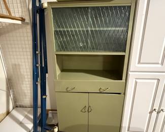 Vintage metal garage cabinet.
