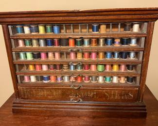 ANTIQUE SPOOL CABINET