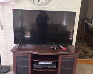 Two month old tv and stand