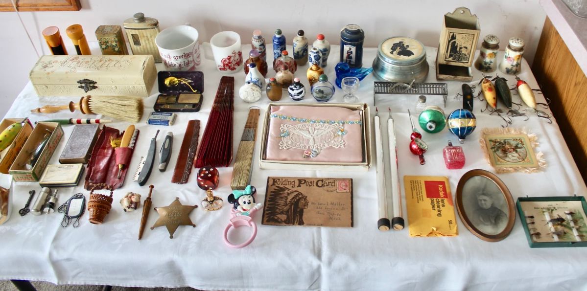 Bakelite Fuller brushs, vintage fishing lures, vintage sewing tools, Chinese snuff bottles and vintage razors