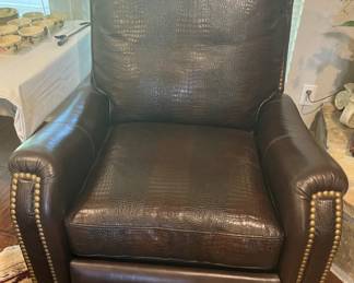One of two matching leather chairs