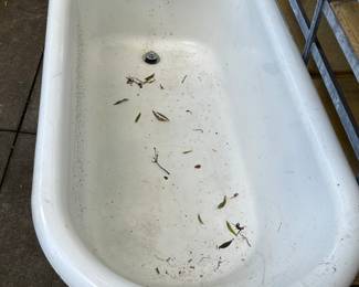Cast iron bath tub with base