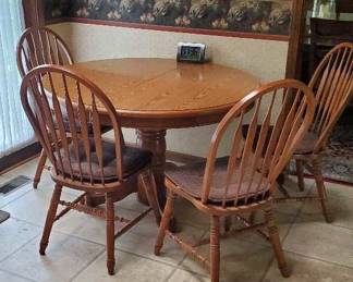 Kitchen table and four chairs.