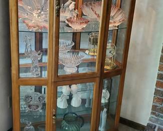 China cabinet, Mikasa crystal items, ceramic music boxes.