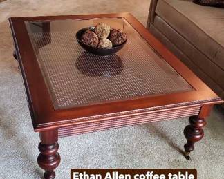 Ethan Allen coffee table (wood, glass, rattan).