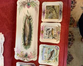 Set of antique fish plates with matching gravy boat and saucer